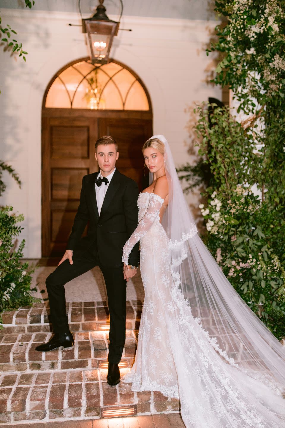 <p>Wearing a custom gown by Virgil Abloh for Off-White, Hailey Baldwin married Justin Bieber in the fall of 2019. The gown took traditional bridal and combined it with Abloh's knack for streetwear. The words "wedding dress" were stitched into the back of the gown in pearls, while the dress itself was subtly embroidered with Off-White's arrow logo. Hailey's veil was equally legendary, thanks to its ALL CAPS embroidery of "TILL DEATH DO US PART" stitched into the hem. </p>