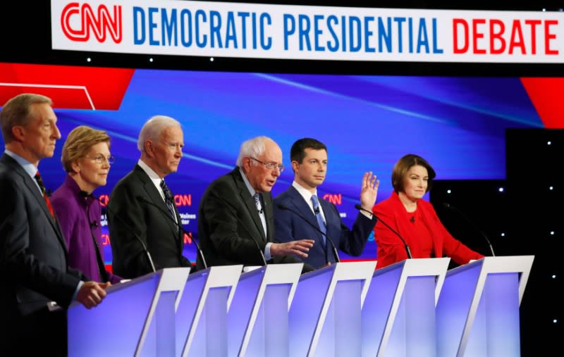 Democratic 2020 U.S. presidential candidates Tom Steyer, Elizabeth Warren, Joe Biden, Bernie Sanders, Pete Buttigieg and Amy Klobuchar participate in the seventh Democratic 2020 presidential debate in Des Moines