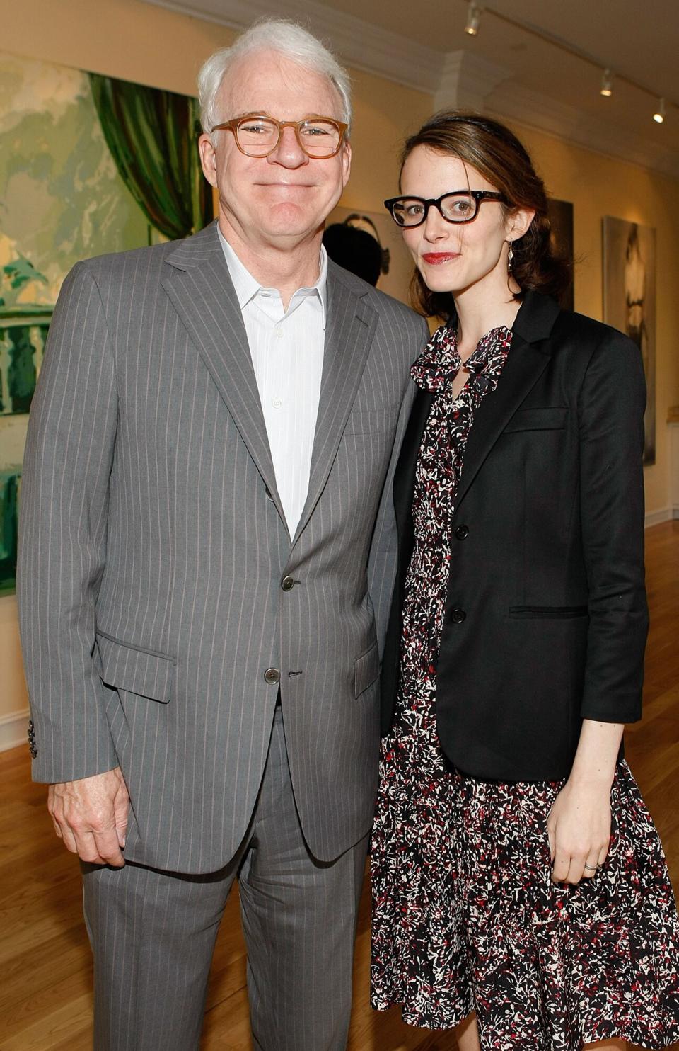 Steve Martin (L) and wife Anne Stringfield attend the presentation of "Wounded" curated by Carole Bayer Sager at LA Art House on May 6, 2009 in West Hollywood, California