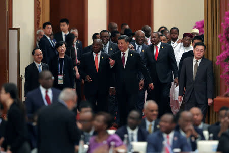 Chinese President Xi Jinping and South African President Cyril Ramaphosa attend the 2018 Beijing Summit Of The Forum On China-Africa Cooperation - Round Table Conference at the Great Hall of the People in Beijing, China September 4, 2018. Lintao Zhang/Pool via REUTERS