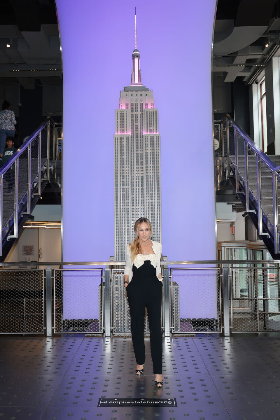 new york, new york june 21 sarah jessica parker lights the empire state building in celebration of the 25th anniversary of sex and the city and the season 2 premiere of and just like that… at the empire state building on june 21, 2023 in new york city photo by dimitrios kambourisgetty images for empire state realty trust