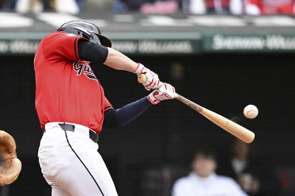 Cleveland Guardians' Will Brennan hits a solo home run off Oakland Athletics starting pitcher Ross Stripling during the second inning of a baseball game, Sunday, April 21, 2024, in Cleveland. (AP Photo/Nick Cammett)