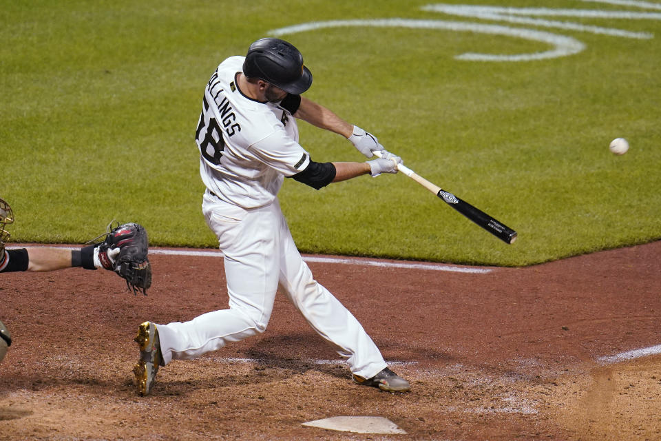 Pittsburgh Pirates' Jacob Stallings hits a two-run home run off San Francisco Giants relief pitcher Jake McGee during the ninth inning of a baseball game in Pittsburgh, Saturday, May 15, 2021. The Pirates won 8-6. (AP Photo/Gene J. Puskar)