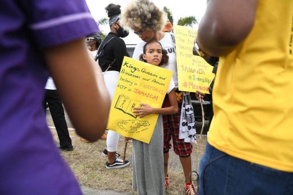 People calling for slavery reparations protest outside the entrance of the British High Commission during the visit of the Duke and Duchess of Cambridge in Kingston, Jamaica on March 22, 2022.<span class="copyright">RICARDO MAKYN/AFP via Getty Images</span>