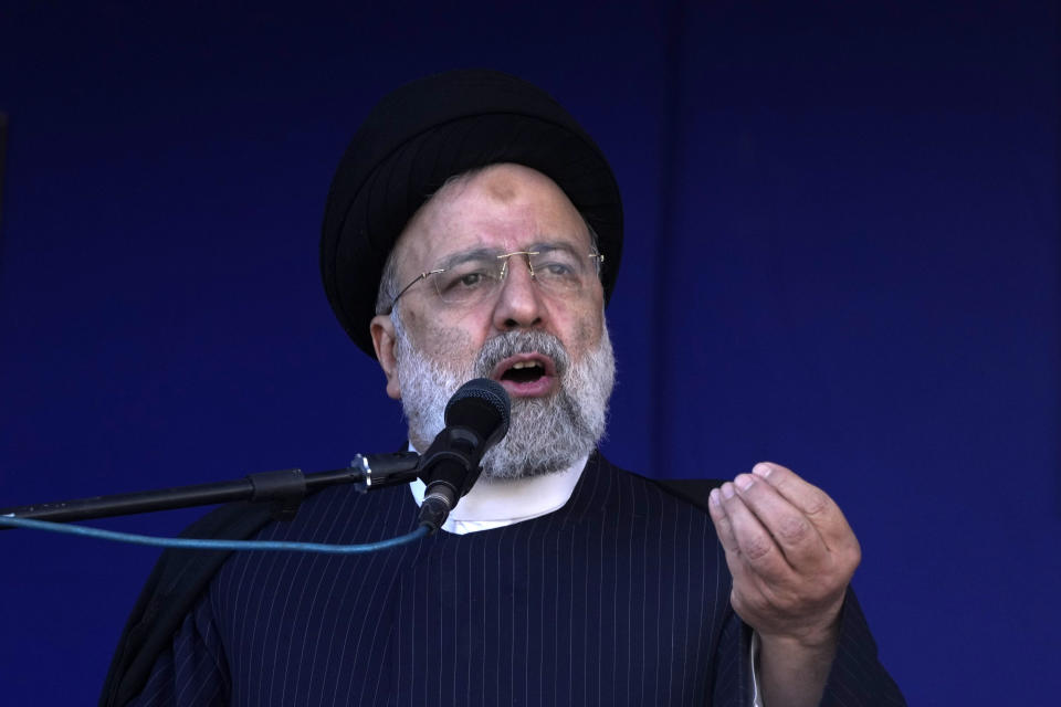 Iranian President Ebrahim Raisi speaks during the funeral ceremony of the victims of Wednesday's bomb explosion in the city of Kerman about 510 miles (820 kms) southeast of the capital Tehran, Iran, Friday, Jan. 5, 2024. Iran on Friday mourned those slain in an Islamic State group-claimed suicide bombing targeting a commemoration for a general slain in a U.S. drone strike in 2020, as the death toll in the attack rose to at least 89. (AP Photo/Vahid Salemi)