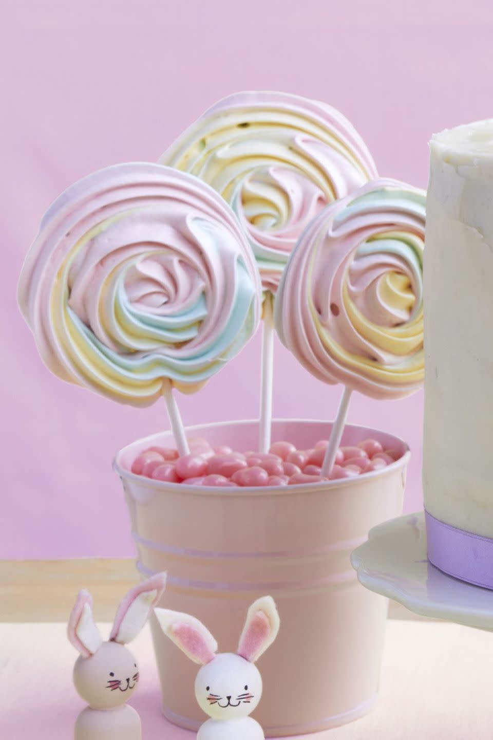 <p>Trust us: Your party guests will gush about these pastel-colored beauties (especially once they take their first bite).</p><p>Get the <strong><a href="https://www.womansday.com/food-recipes/food-drinks/a19123087/meringue-pops-recipe/" rel="nofollow noopener" target="_blank" data-ylk="slk:Meringue Pops recipe.;elm:context_link;itc:0;sec:content-canvas" class="link ">Meringue Pops recipe.</a></strong></p>