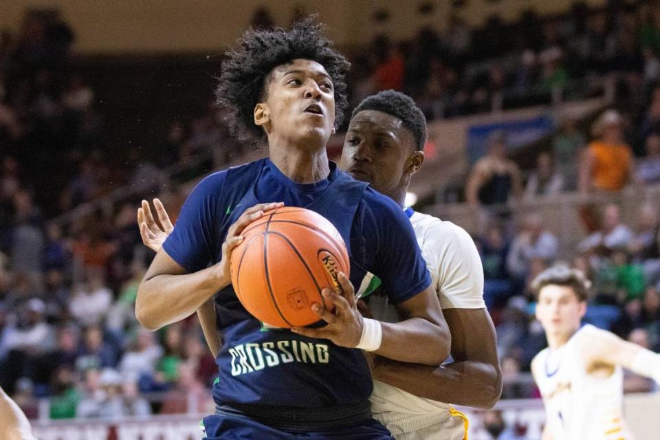 Great Crossing’s Vince Dawson drives the ball during the Warhawks’ game against Henry Clay on March 4. Michael Clubb