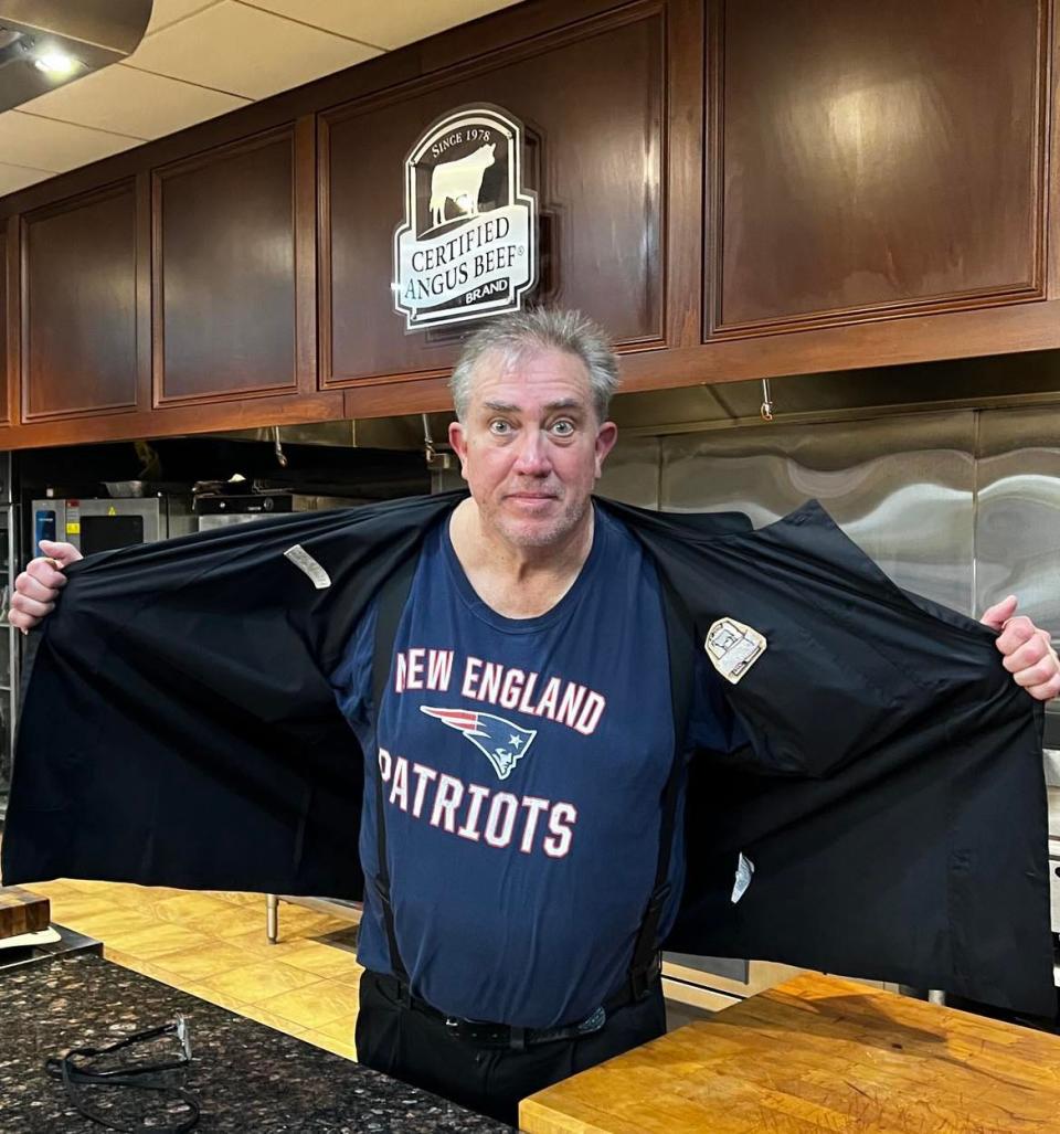 Certified Angus Beef Chef Tony Biggs reveals his favorite football team during a tasting event in preparation for the Pro Football Hall of Fame Enshrinement Festival's Gold Jacket Dinner.