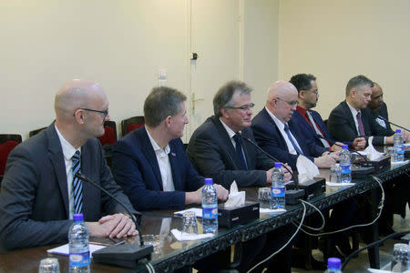 Members of the far-right Alternative for Germany (AfD) meet with Syrian members of the Arab and foreign affairs committee at the People’s Assembly in Syria March 6, 2018. SANA/Handout via REUTERS