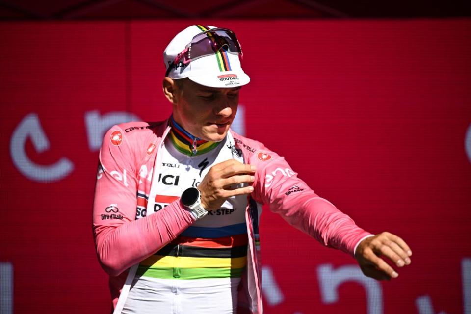 Belgian Remco Evenepoel of Soudal QuickStep celebrates on the podium after winning the first stage of the 2023 Giro DItalia cycling race an individual time trial from Fossacesia Marina to Ortona 196 km in Italy Saturday 06 May 2023 The 2023 Giro takes place from 06 to 28 May 2023BELGA PHOTO JASPER JACOBS Photo by JASPER JACOBS  BELGA MAG  Belga via AFP Photo by JASPER JACOBSBELGA MAGAFP via Getty Images