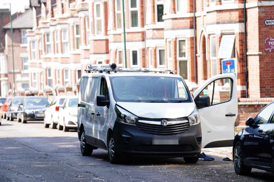 A white van behind a police cordon on the corner of Maples Street and Bentinck Road in Nottingham. (PA)