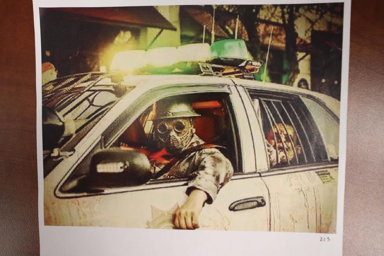 Bryan Patrick Miller is pictured in his "Zombie Hunter" car. This photo was entered as evidence at his trial.