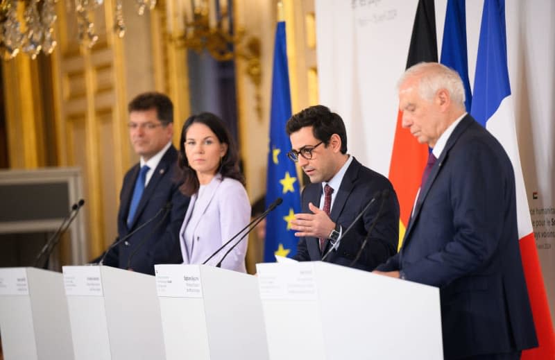 Annalena Baerbock (2nd L), Germany's Foreign Minister, Stephane Sejourne (2nd R), France's Foreign Minister, Josep Borrell (R), European Union High Representative for Foreign Affairs, and Janez Lenarcic (L), EU Commissioner for Crisis Management, speak at a press conference ahead of the ministerial meeting to support peace initiatives for Sudan. Bernd von Jutrczenka/dpa