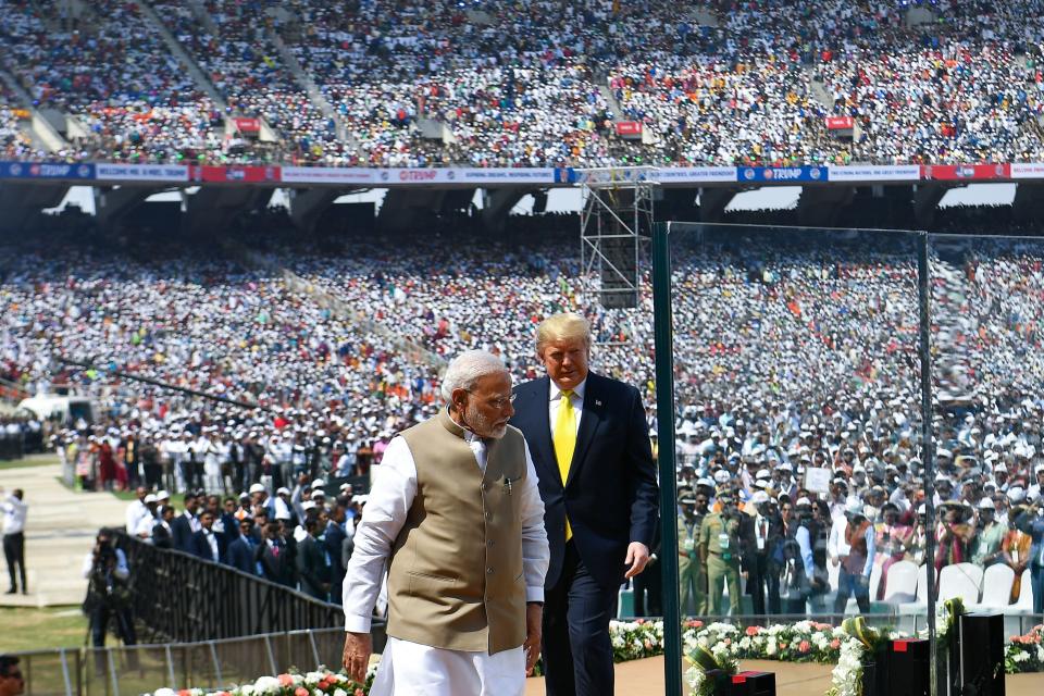 US President Donald Trump (R) and India's Prime Minister Narendra Modi arrive to attend 'Namaste Trump' rally at Sardar Patel Stadium in Motera, on the outskirts of Ahmedabad, on February 24, 2020. (Photo by Mandel NGAN / AFP) (Photo by MANDEL NGAN/AFP via Getty Images)