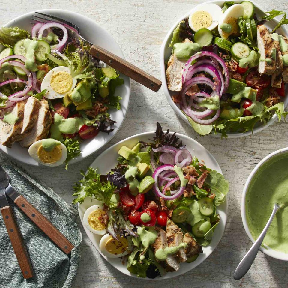 <p>This copycat Panera Green Goddess Cobb Salad is easy to make at home. Adding a simple Dijon mixture to the chicken gives it a boost of flavor that works well with the green goddess dressing. The dressing would also work well as a dip or spread, or over potato or pasta salad. <a href="https://www.eatingwell.com/recipe/7996348/copycat-panera-green-goddess-cobb-salad/" rel="nofollow noopener" target="_blank" data-ylk="slk:View Recipe;elm:context_link;itc:0;sec:content-canvas" class="link ">View Recipe</a></p>
