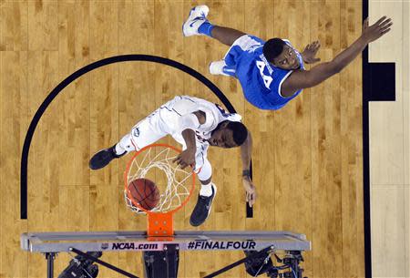 Apr 7, 2014; Arlington, TX, USA; Connecticut Huskies forward DeAndre Daniels (2) dunks after getting past Kentucky Wildcats center Dakari Johnson (44) in the first half during the championship game of the Final Four in the 2014 NCAA Mens Division I Championship tournament at AT&T Stadium. Robert Deutsch-USA TODAY Sports