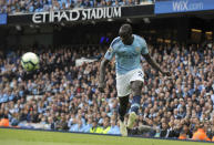 FILE - In this Saturday, Oct. 20, 2018 file photo, Manchester City's Benjamin Mendy kicks the ball during the English Premier League soccer match between Manchester City and Burnley at Etihad stadium in Manchester, England. It has often been viewed as the least glamorous position in soccer, a role no kid wanted to have on the school field and one that was long overlooked even in the professional game but the role of the full back, however, has had a makeover in recent years and nowhere is the position’s resurgence better demonstrated than in the Premier League this season. (AP Photo/Rui Vieira, File)