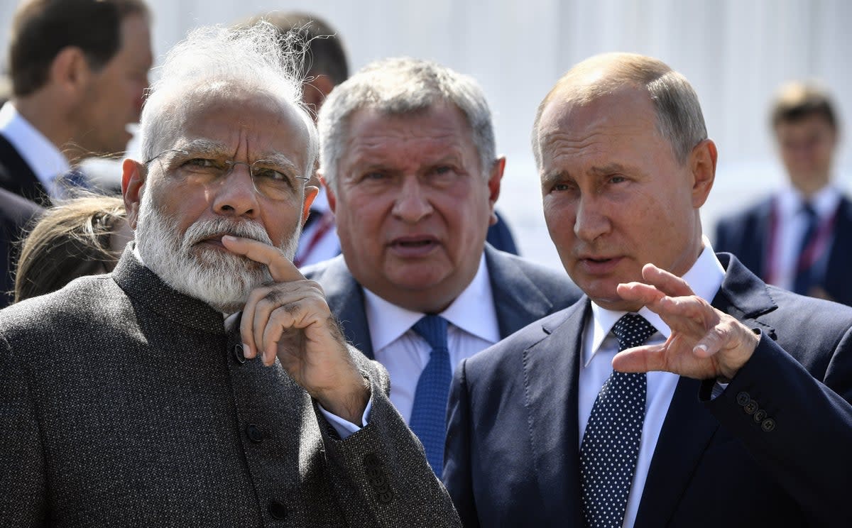 Narendra Modi and Vladimir Putin have remained close despite the ongoing conflict in Ukraine (AFP via Getty)