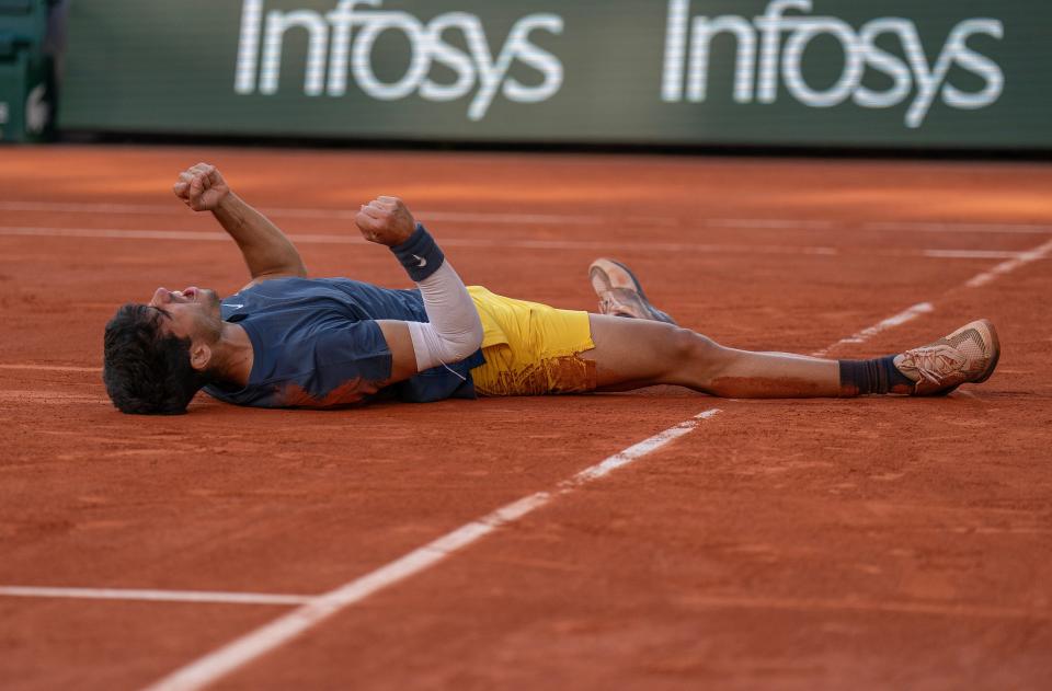 Carlos Alcaraz celebrates winning the French Open men’s singles final against Alexander Zverev on Day 15 at Roland Garros.