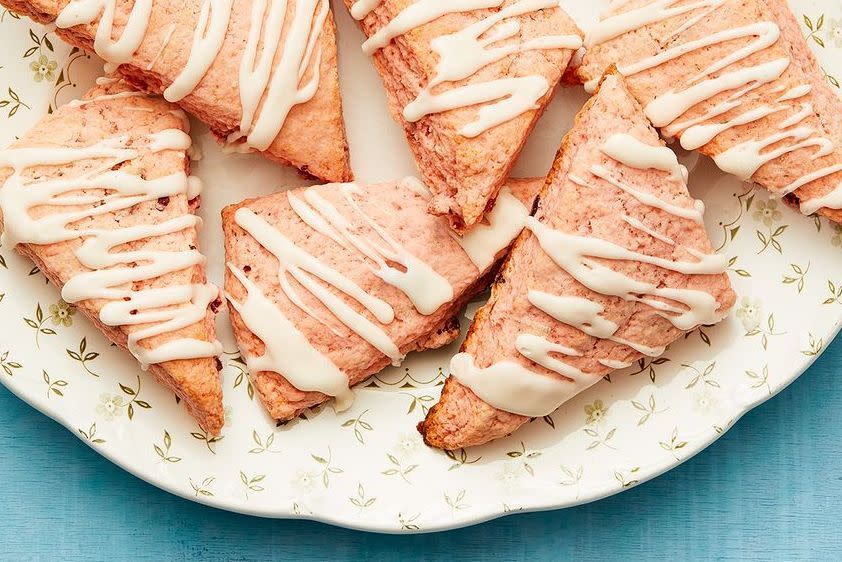 strawberries and cream scones with blue background