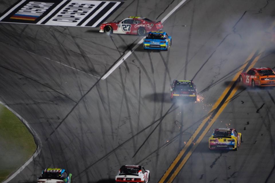 Cars crash during a big accident on lap 41 of the Xfinity Series Wawa 250 on Friday night.