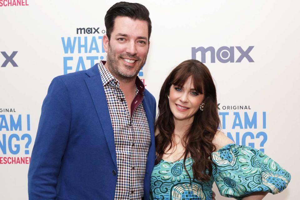 <p>Anna Webber/Getty </p> Jonathan Scott and Zooey Deschanel