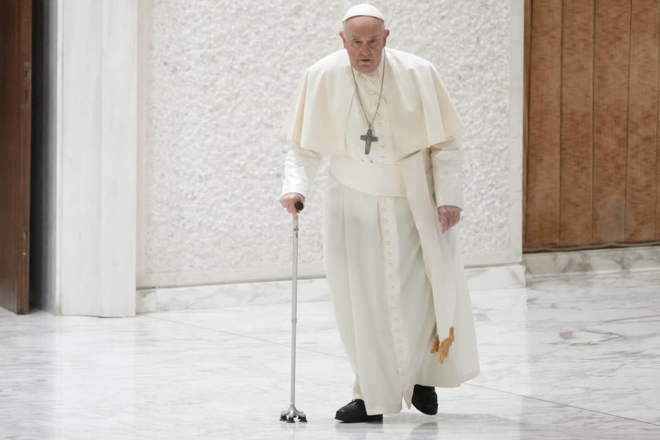 Pope Francis arrives in the Paul VI hall on the occasion of the weekly general audience at the Vatican, Wednesday, March 27, 2024. (AP Photo/Gregorio Borgia)