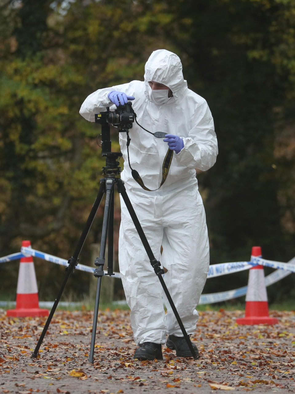 Forensic investigators at Watlington Hill in Oxfordshire after the body of a woman was discovered at the National Trust estate, a man has been arrested on suspicion of murder and is being treated for serious injuries, police said.