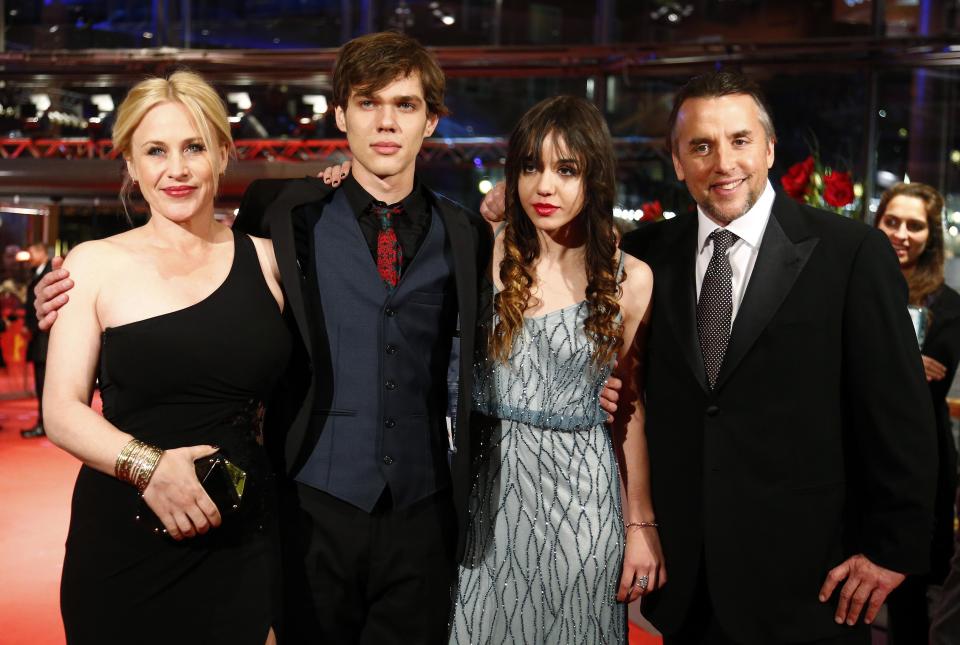 (L-R) Cast members Patricia Arquette, Ellar Coltrane and Lorelei Linklater, and director, screenwriter and producer Richard Linklater arrive on the red carpet to promote the movie "Boyhood" during the 64th Berlinale International Film Festival in Berlin February 13, 2014. REUTERS/Tobias Schwarz (GERMANY - Tags: ENTERTAINMENT)