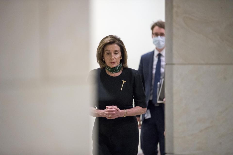 House Speaker Nancy Pelosi of Calif., arrives for a news conference on Capitol Hill, Thursday, May 14, 2020, in Washington. (AP Photo/Andrew Harnik)