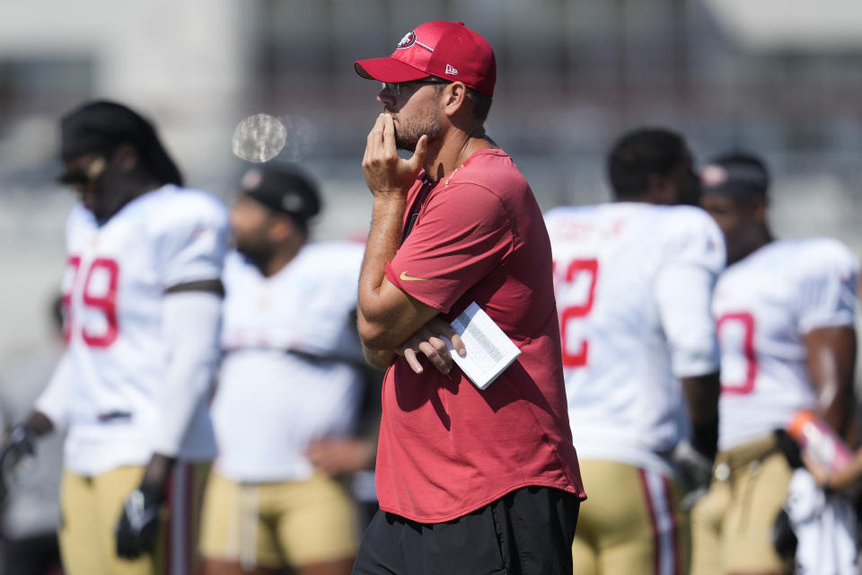 San Francisco 49ers defensive line coach Kris Kocurek watches as players take part in drills during the NFL team's football training camp in Santa Clara, Calif., Monday, July 31, 2023. (AP Photo/Jeff Chiu)