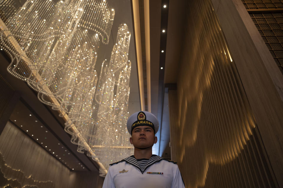 A Chinese sailor stands on duty outside the venue for the Western Pacific Navy Symposium in Qingdao in eastern China's Shandong province on Monday, April 22, 2024. Zhang Youxia, Vice Chairman of the CPC Central Military Commission, China's second-ranking military leader under Xi Jinping, said China committed to solve maritime disputes through dialogue but warned that International law could not be distorted.(AP Photo/Ng Han Guan)