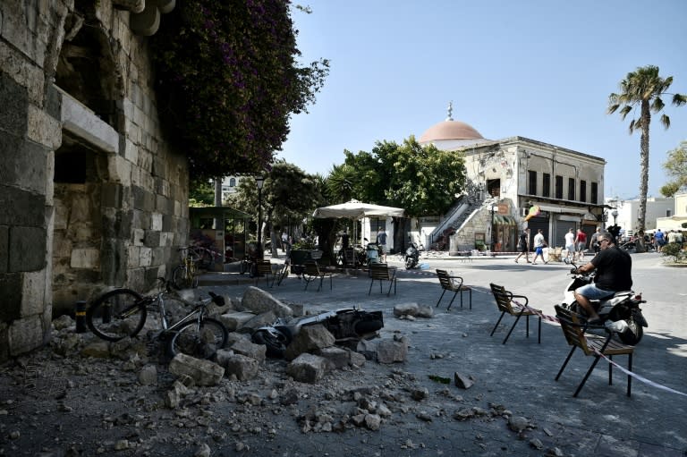 Greek police said a 22-year-old Swede and a 39-year-old Turk died in the quake that hit the island of Kos