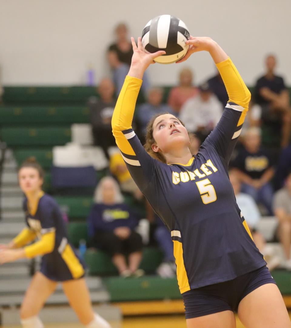 Copley's Shelby Emich sets the ball against Highland on Tuesday, Sept. 20, 2022 in Hinkley.