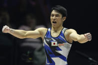 Wataru Tanigawa of Japan competes on the vault at the Men's All-Around Final during the Artistic Gymnastics World Championships at M&S Bank Arena in Liverpool, England, Friday, Nov. 4, 2022. (AP Photo/Thanassis Stavrakis)