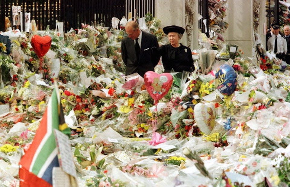 Prince Philip and Queen Elizabeth near memorial of Princess Diana