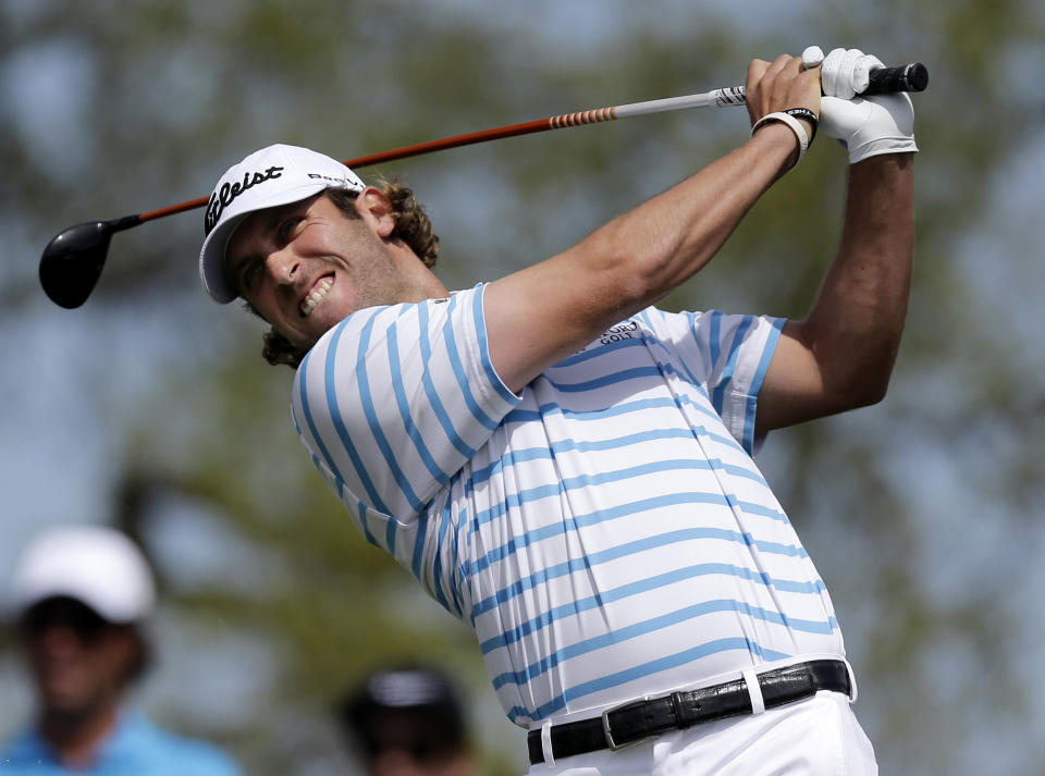 Andrew Loupe hits his tee shot on the second hole during the third round of the Texas Open golf tournament, Saturday, March 29, 2014, in San Antonio. (AP Photo/Eric Gay)