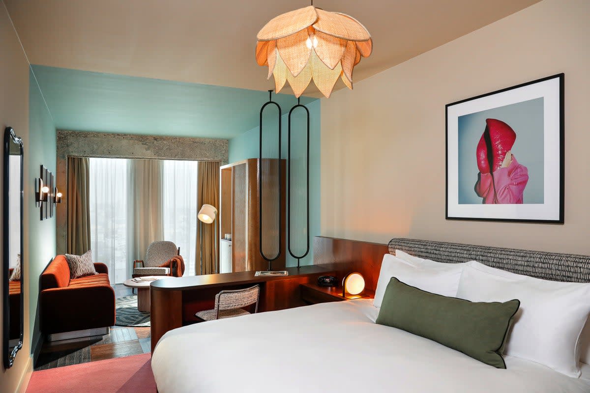 The hotel has a 1970s aesthetic – think modular furniture, lily-shaped lighting and velvet sofas (The Hoxton, Brussels)