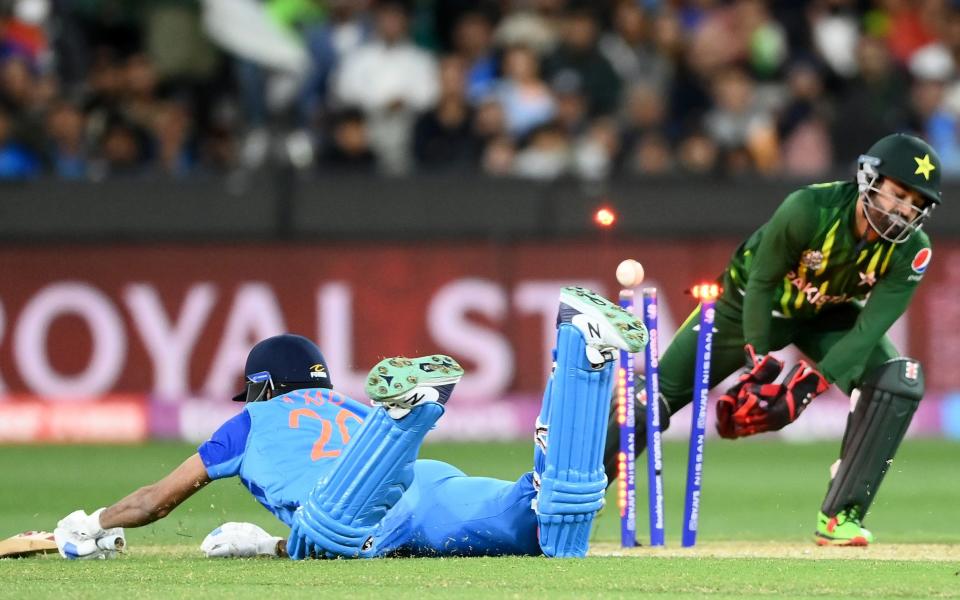 Axar Patel of India is run out during the ICC Men's T20 World Cup match between India and Pakistan at Melbourne Cricket Ground