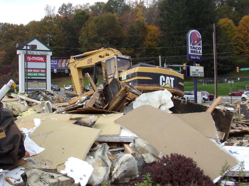 The former Taco Bell restaurant at the Route 6 Plaza in Texas Township, near Honesdale, was taken down October 20, 2023. The restaurant had burned September 21, 2021, and was quickly boarded up. Taco Bell opened here in 2013 in the same building that housed an Arby's fast-food restaurant from the mid-1990's until 2010. Pioneer Construction demolished the building.
