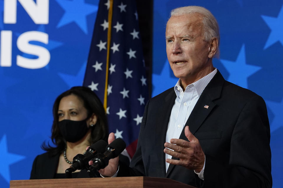 Democratic presidential candidate former Vice President Joe Biden speaks Thursday, Nov. 5, 2020, in Wilmington, Del. Democratic vice presidential candidate Sen. Kamala Harris, D-Calif., stands at left. (AP Photo/Carolyn Kaster)