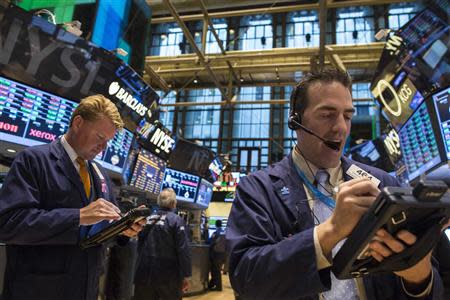 Traders work on the floor of the New York Stock Exchange, October 30, 2013. REUTERS/Brendan McDermid