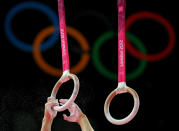 A detail view of an athlete chalking the rings in the Artistic Gymnastics Men's Individual All-Around final on Day 5 of the London 2012 Olympic Games at North Greenwich Arena on August 1, 2012 in London, England. (Photo by Ronald Martinez/Getty Images)