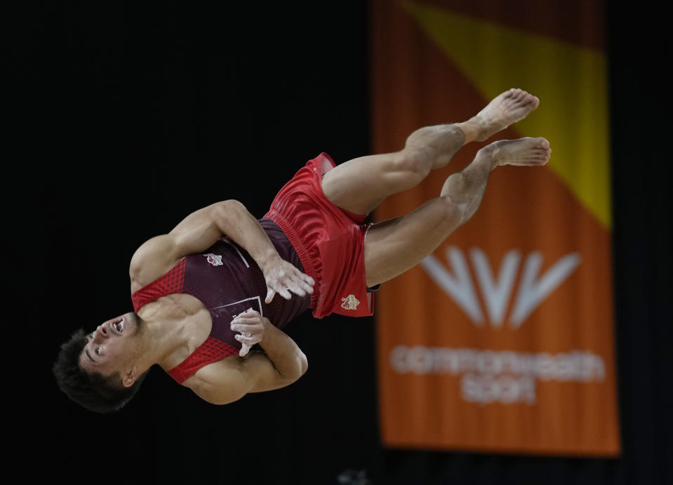 Jake Jarman of England competes at Floor exercise in the men's all-around finals at the Commonwealth Games, in Birmingham, England, Sunday, July 31, 2022. (AP Photo/Manish Swarup)