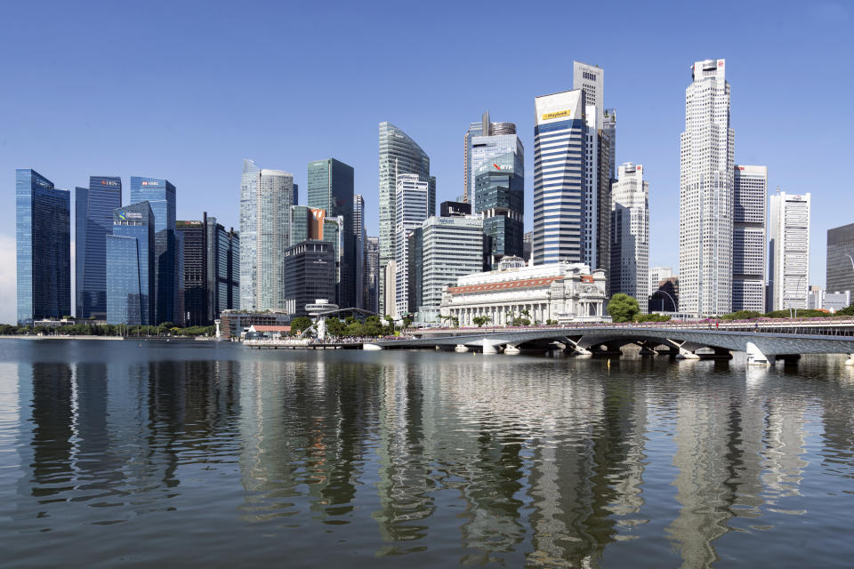 Singapore’s strong corporate governance and predictable political environment are also appealing and help it retain a competitive edge. (Photographer: Lauryn Ishak/Bloomberg)