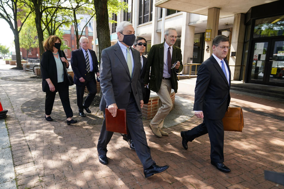 Former Penn State President Graham Spanier walks from the Dauphin County Courthouse in Harrisburg, Pa., after a hearing at Wednesday, May 26, 2021. A judge has upheld the jail sentence of Spanier who was forced out as the school's top administrator after Jerry Sandusky was arrested nearly a decade ago. The judge said Spanier must report to jail on July 9 to begin serving at least two months for endangering the welfare of children, followed by two months of house arrest. (AP Photo/Matt Rourke)