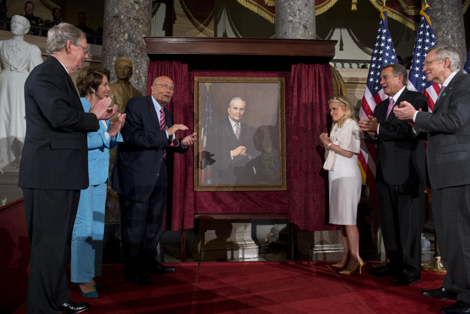 Senate Minority Leader Mitch McConnell (R-Ky.), House Minority Leader Nancy Pelosi (D-Calif.), Dingell, Dingell's wife Debbie, Speaker John Boehner (R-Ohio) and Senate Majority Leader Harry Reid (D-Nev.) applaud during a portrait unveiling in the Capitol's Statuary Hall at&nbsp;a ceremony to honor Dingell as the longest-serving member of Congress.