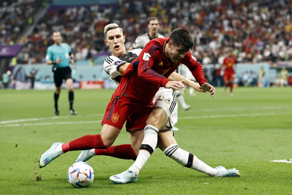 AL KHOR - (l-r) Alvaro Morata of Spain, Nico Schlotterbeck of Germany during the FIFA World Cup Qatar 2022 group E match between Spain and Germany at Al Bayt Stadium on November 27, 2022 in Al Khor, Qatar. AP | Dutch Height | MAURICE OF STONE (Photo by ANP via Getty Images)