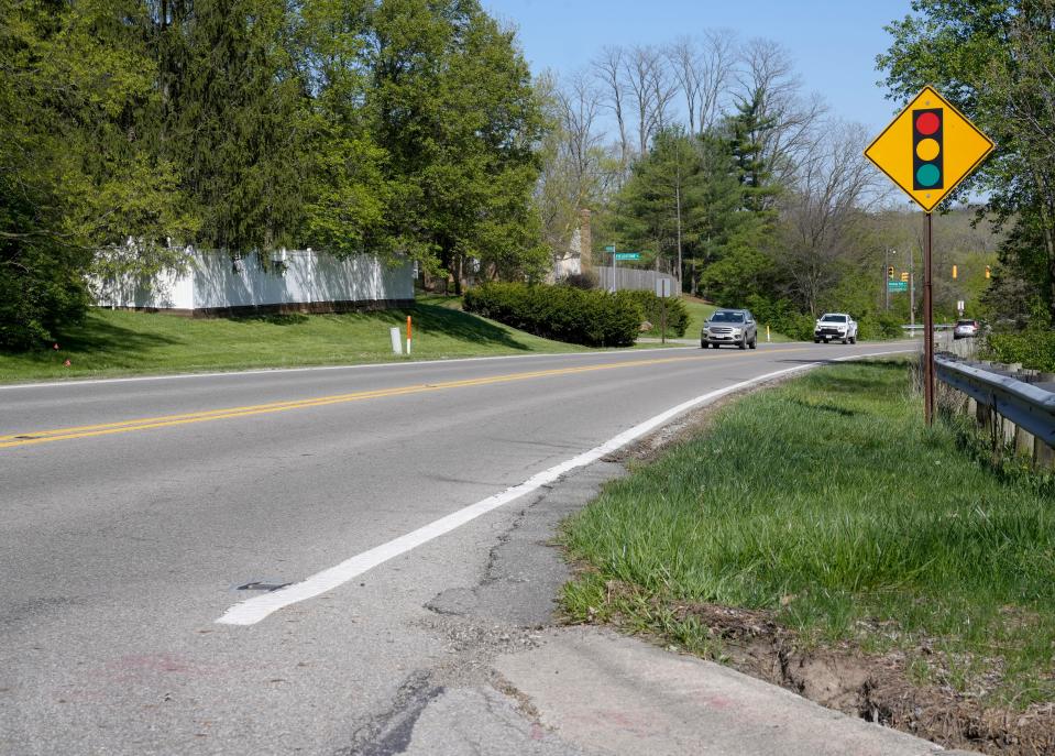 The Honigford family lives in a cul-de-sac at the intersection of Constitution Place and Wilson Bridge Road on Columbus' Northwest Side near Worthington. The sidewalk stops right at their driveway, and the family feels trapped by a busy thoroughfare with no walkway other than the road's narrow shoulder.