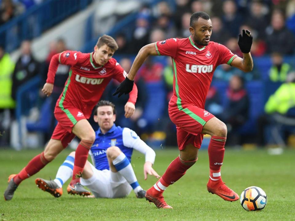 Jordan Ayew surges forward for the visitors (Getty)